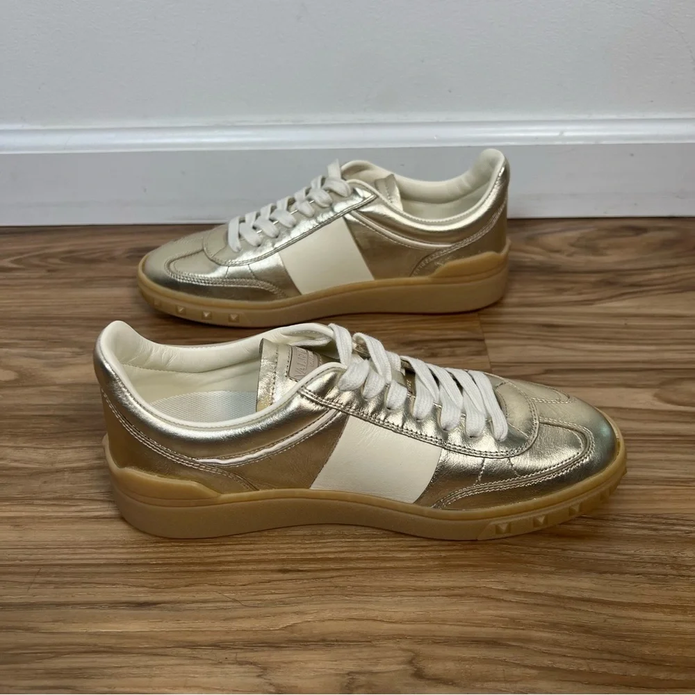 Valentino Garavani Women’s Upvillage Trainer Sneakers in Laminated Calfskin Gold